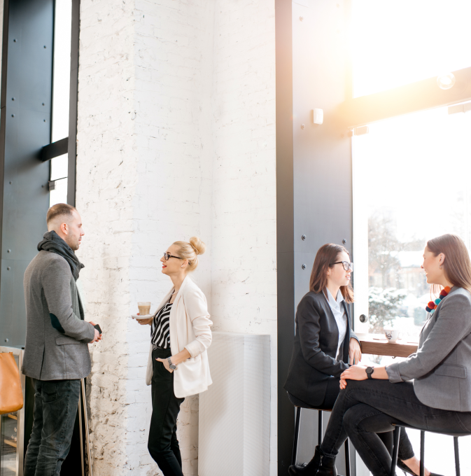 GTM professionals networking at a conference, representing future award nominees